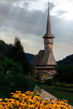 photo of the tallest wooden church situated in romani, maramures. 