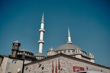 Corner and low angle photo of Taksim Mosque. - Powered by Adobe