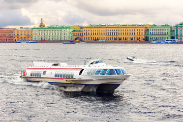 Passenger boat walking along the waterfront in St. Petersburg. Motor boat. Photo.