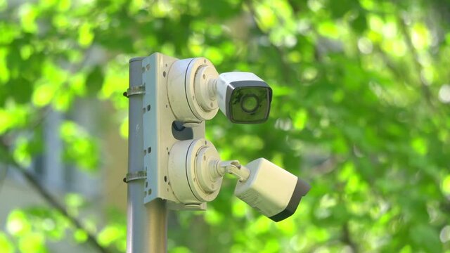 Security cameras on the pole in 4k slow motion 60fps