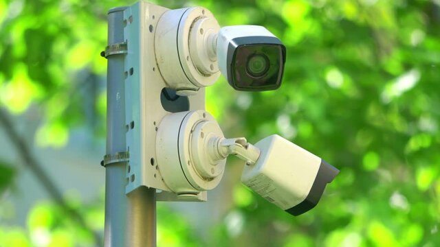 Security cameras on the pole in 4k slow motion 60fps