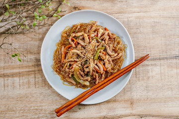 Korean style stir-fried glass noodles pork and vegetables