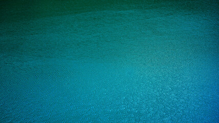 Beautiful blue green water background. Ripples on the surface. Dark turquoise background with copy...