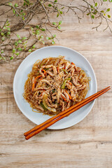 Korean style stir-fried glass noodles pork and vegetables