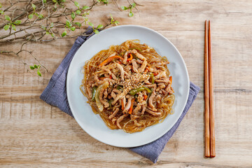 Korean style stir-fried glass noodles pork and vegetables