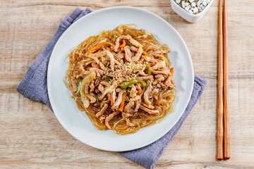 Korean style stir-fried glass noodles pork and vegetables