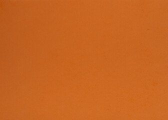 Old orange paper background. Bright orange decorative surface.