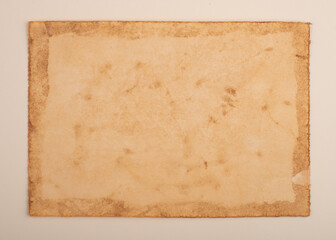 Naklejka premium Old vintage paper background. Textured grunge surface.