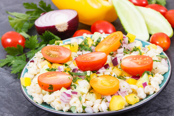 Fresh salad with bulgur groats and vegetables as best food for dieting and slimming