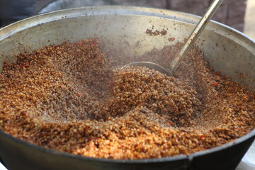 Buckwheat porridge in a cauldron on the street
