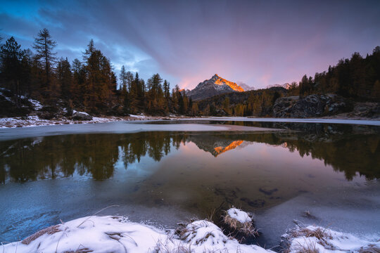 Muful&egrave; lake in Autumn season at dawn in Valmalenco, Valtellina, Italy.