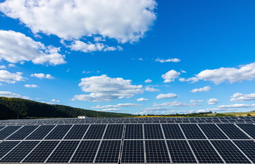 solar panels with the sunny sky. Blue solar panels. background of photovoltaic modules for renewable energy