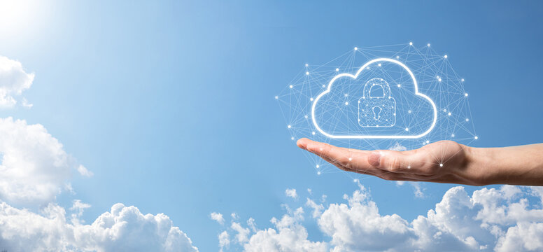 Business man hold,holding cloud computing data and security on global networking,Padlock and cloud icon. Technology of business.Cybersecurity and information or network protection.internet project
