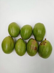 Kedondong fruit is green with a white background