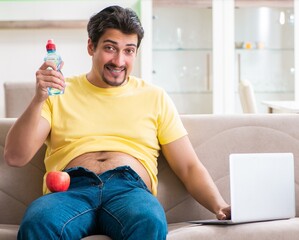 Man suffering from extra kilos in dieting concept