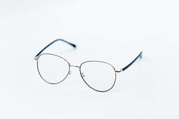 vintage shaped spectacles on white background