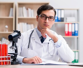 Young adult doctor working in the hospital