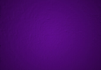 Fondo morado de pared con textura en degradado.
