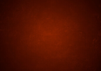 Fondo rojo de pared con textura en degradado.