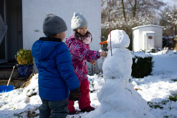 children playing in snow