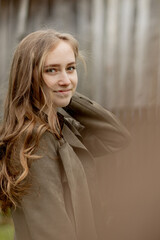 Fototapeta premium Portrait of young beautiful girl in outdoors
