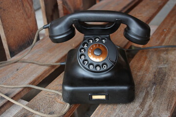 Black retro telephone W48 with rotary dial