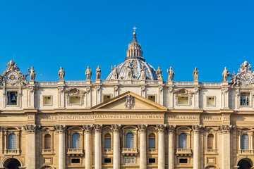 Fototapeta na wymiar A view of main facade and dome of St. Peter's Basilica in the Vatican city, Rome, Italy
