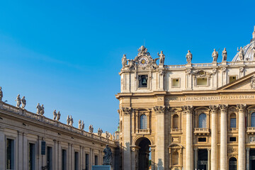 Fototapeta na wymiar A part of main facade and Arch of the Bells Entrance of St. Peter's Basilica in the Vatican city, Rome, Italy