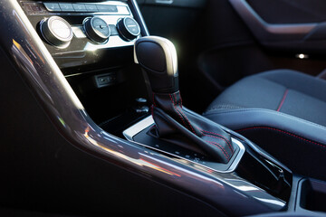 Automatic Transmission Stick and Elegant Car Interior with black and silver elements