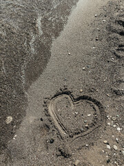 footprints in the sand and sea