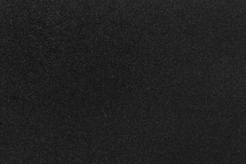 Black background with shallow relief dots