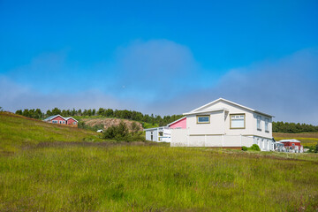 Fototapeta na wymiar Buildings on Island of Hriesy in Eyjafjordur in Iceland