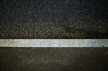Fototapeta premium Road pavement brick limiter background