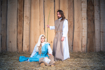 Traditional nativity scene with Virgin Mary, baby jesus and Joseph
