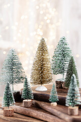 Christmas tree on bohek wooden, bokeh background.