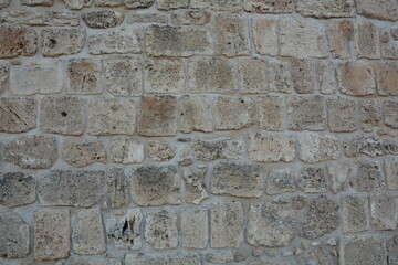Texture of a stone wall. Old castle stone wall texture background. Stone wall as a background or texture. Part of a stone wall, for background or texture