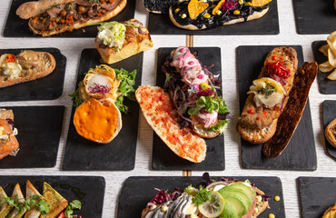 Variety of creative sandwiches on the restaurant table