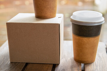 coffee in cardboard brown cups ordered and delivered for takeaway, food delivery, takeout, copy space for text.
