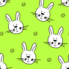 Seamless pattern with cute hand drawn bunny head in doodle style,easter illustration with rabbit,holiday decoration,print for wrapping paper,textile and fabric,kids fashion,nursery design,baby shower.