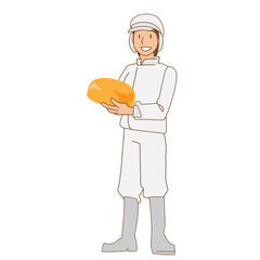 熟成チーズを持つチーズ工房の女性