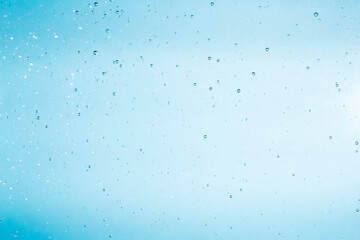 Bubbles of water on blue background