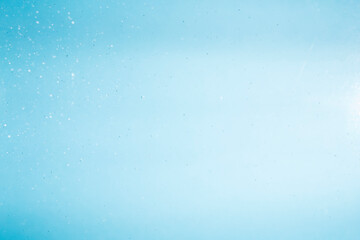 Bubbles of water on blue background