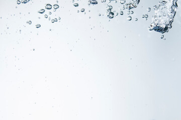 Bubbles of water on blue background