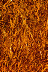 festive shining background made of gold foil. High quality photo