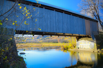Centennial covered bridge in countryside in Quebec, Canada