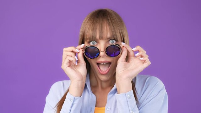 Excited shocked lady take off vintage specs girlish omg reaction