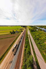Aerial panoramic view of pathway, road and railway in place Myllykoski in Kouvola, Finland.