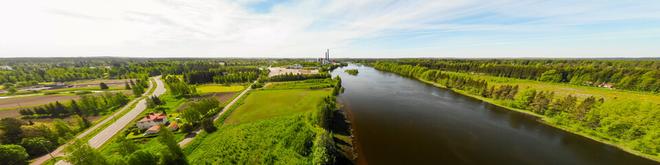 Fototapeta na wymiar Aerial panoramic view of place Myllykoski at river Kymijoki, Kouvola, Finland.