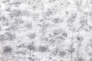 Gray generic background in grunge style suitable for food photography and flat lay photography. Wooden panel plastered and painted in white and mouse gray.