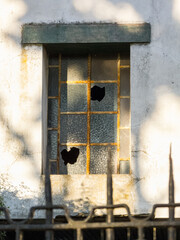 Glass of windows, broken and in decay